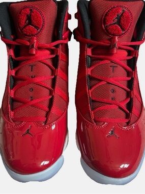 Jordan’s men’s  Red High-Top Retro Basketball Sneakers